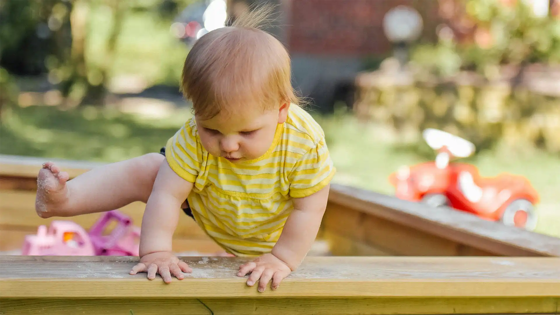 Baby learning through play at Blossoms Childcare